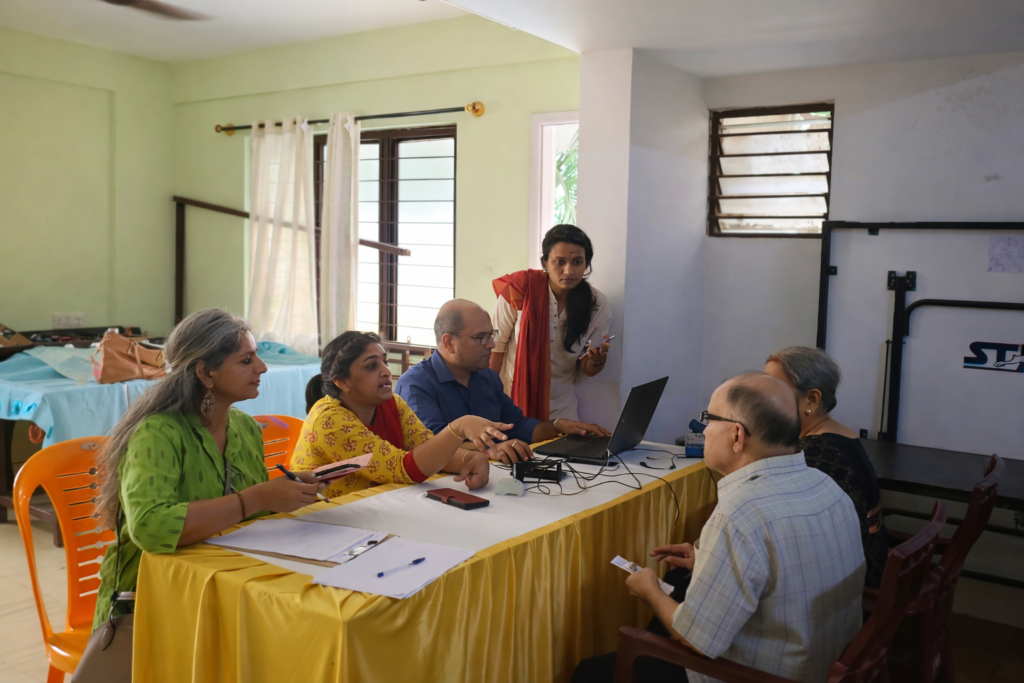 meeting with elderly and younger assistance